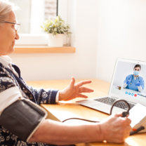 Senior Woman Telehealth Visit with Doctor at Home