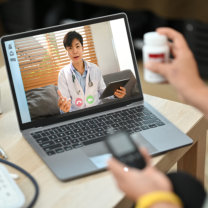 Online Doctor Consultation via Video Call on Laptop