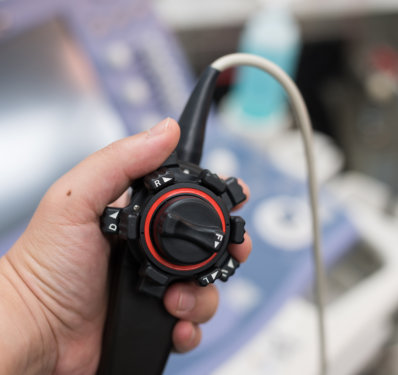 Hand holding ultrasound transducer probe