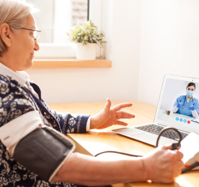 Senior Woman Telehealth Visit with Doctor at Home